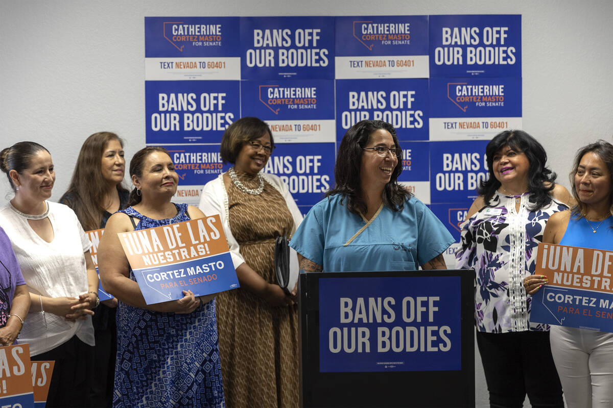 SEIU Local 1107 HCA healthcare worker Erika Watanabe speaks during a news conference where Sen. ...