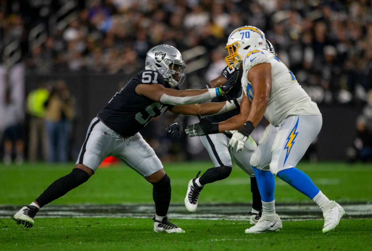 Raiders defensive end Malcolm Koonce (51) works against Los Angeles Chargers offensive tackle R ...