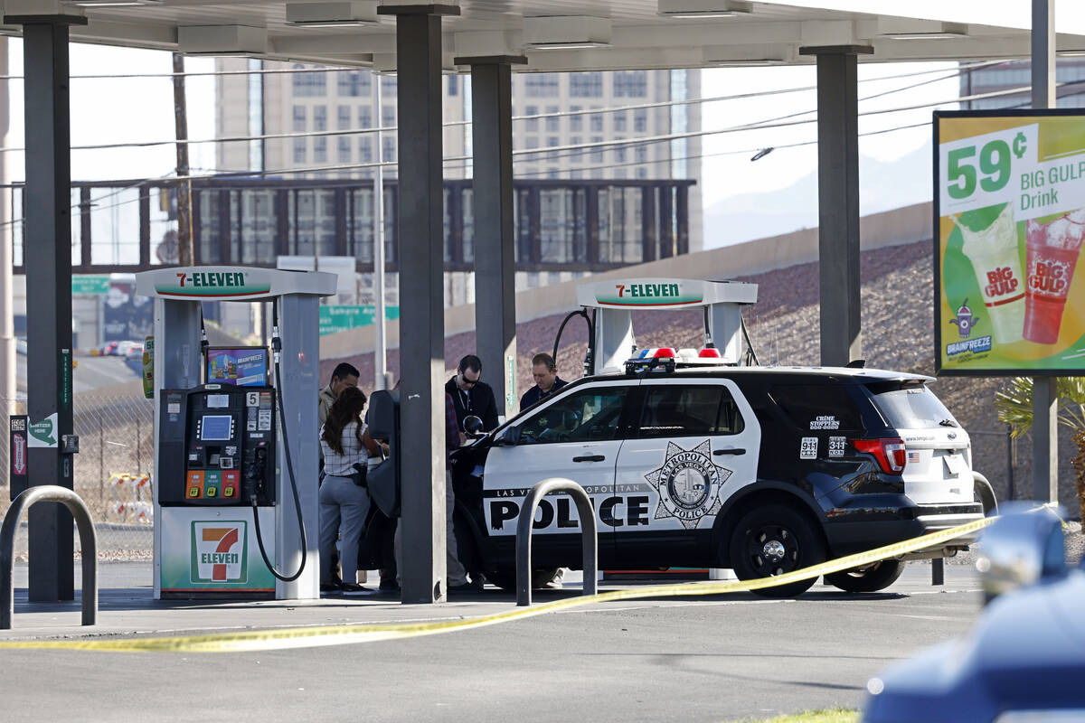 Las Vegas police investigate a fatal shooting at a 7-Eleven, 1601 W. Oakey Blvd., Saturday, Ju ...