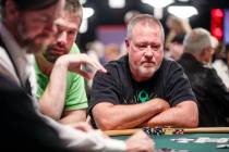 Craig Reifsnyder, of Pennsylvania, plays poker during the first flight of the $10,000 Main Even ...