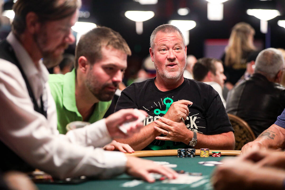 Craig Reifsnyder, of Pennsylvania, plays poker during the first flight of the $10,000 Main Even ...