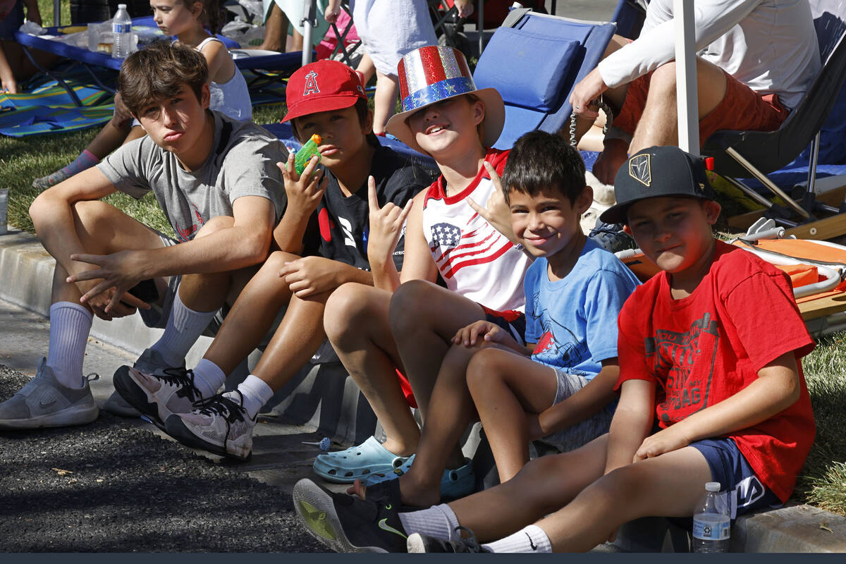 Children pose for a photo during the 28th Annual Summerlin Council Patriotic Parade, Monday, Ju ...