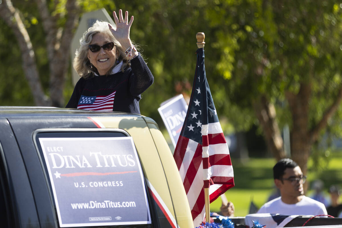 Congresswoman Dina Titus waves at the crowd during Boulder City's 74th annual 4th of July Parad ...