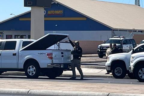 Police investigate a suspicious device Tuesday, July 5, 2022, found near a business on Tropican ...