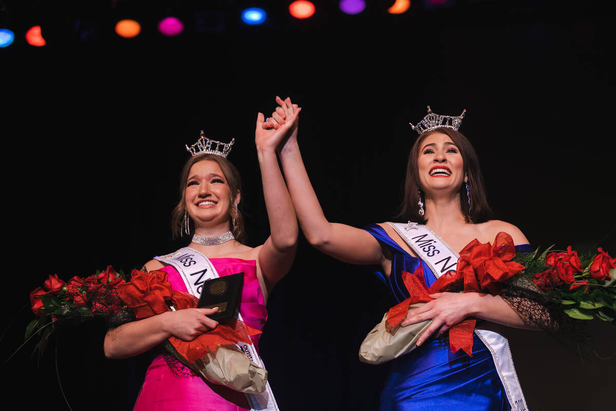 Miss Nevada 2022, Heather Renner, right, holds hands up with Miss Nevada's Outstanding Teen, Me ...