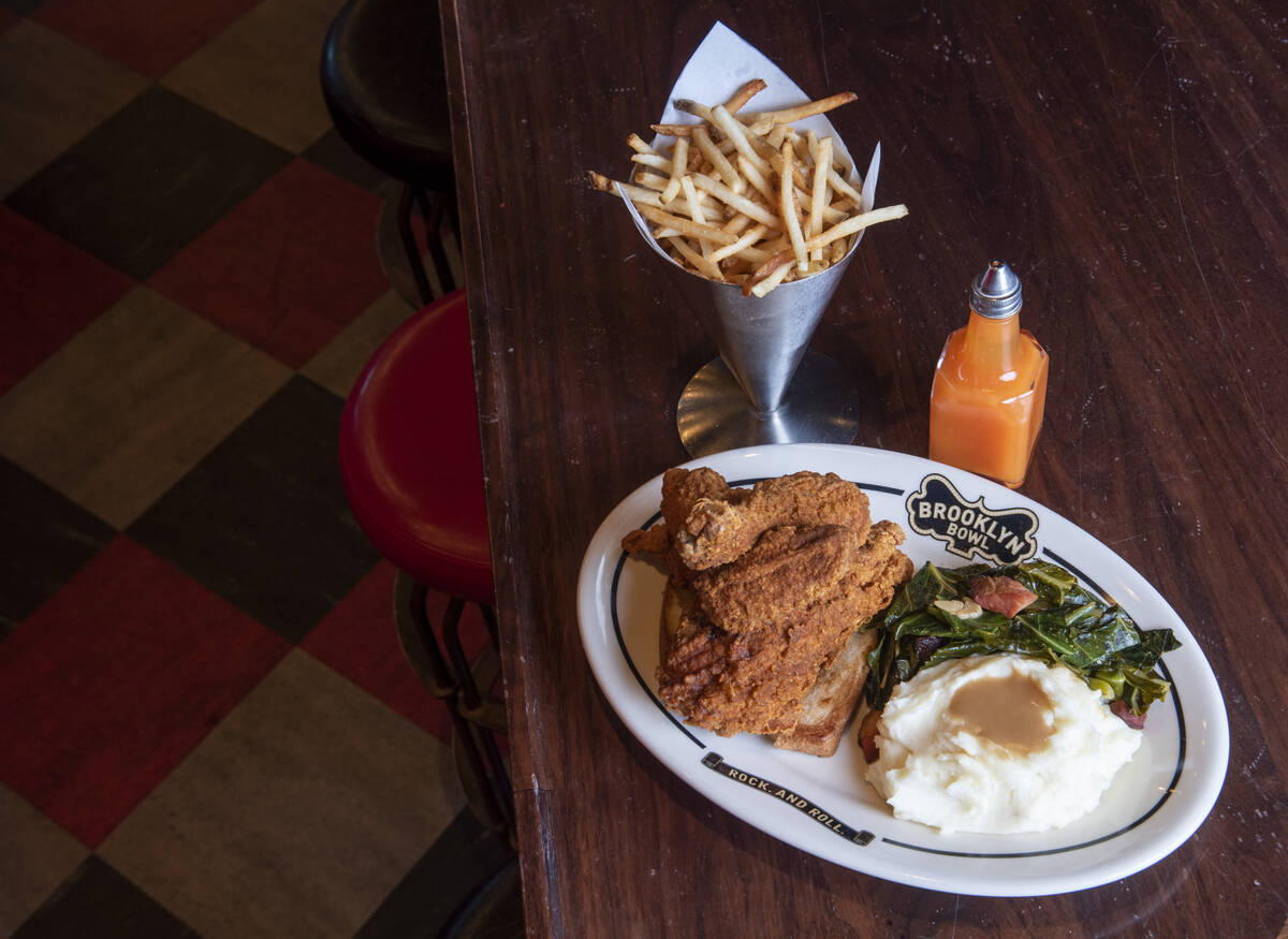 The fried chicken dinner with french fries at Brooklyn Bowl on Friday, July 8, 2022, in Las Veg ...
