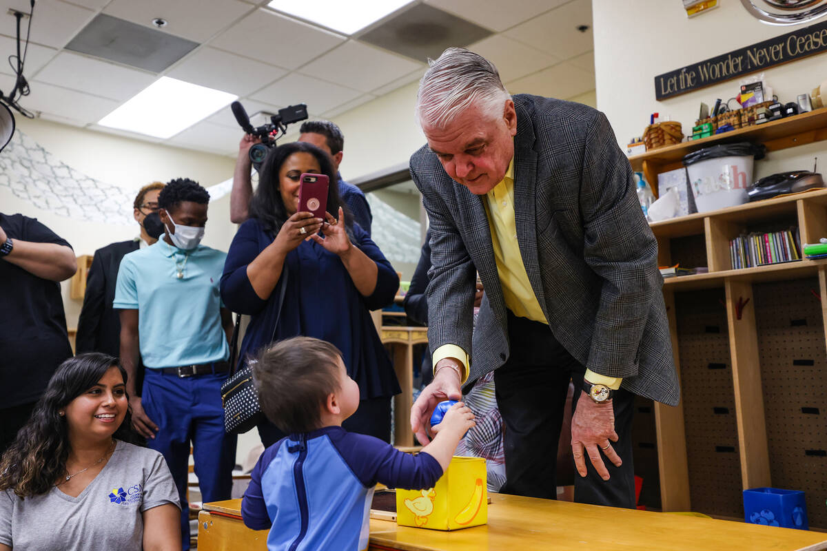 Gov. Steve Sisolak hangs out with Cassian Lee, 1, at the College of Southern Nevada’s Ea ...