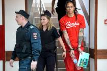 WNBA star and two-time Olympic gold medalist Brittney Griner is escorted to a courtroom for a h ...