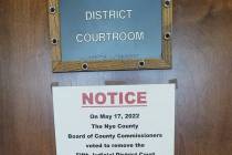 A sign was posted on a courthouse door in Nye County announcing court for the day was canceled. ...