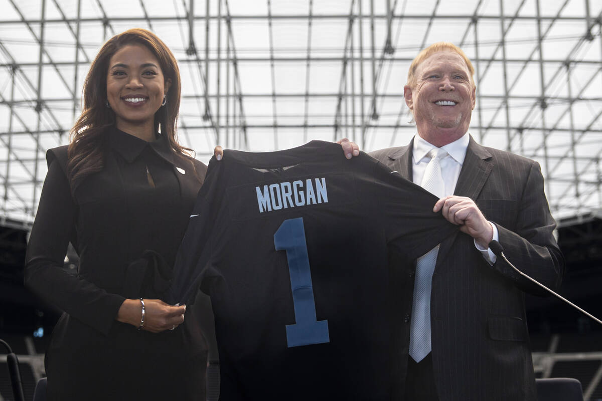 Raiders owner Mark Davis poses for a portrait with new team president Sandra Douglass Morgan on ...