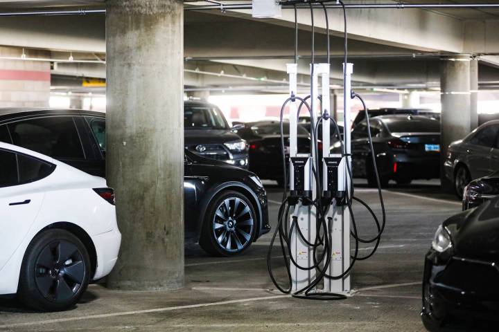 One of the new electric vehicle charging stations at Harry Reid International Airport in Las Ve ...