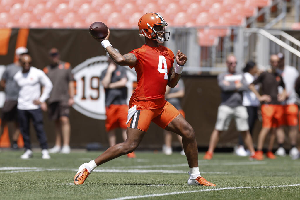 Cleveland Browns quarterback Deshaun Watson throws a pass during an NFL football practice at Fi ...