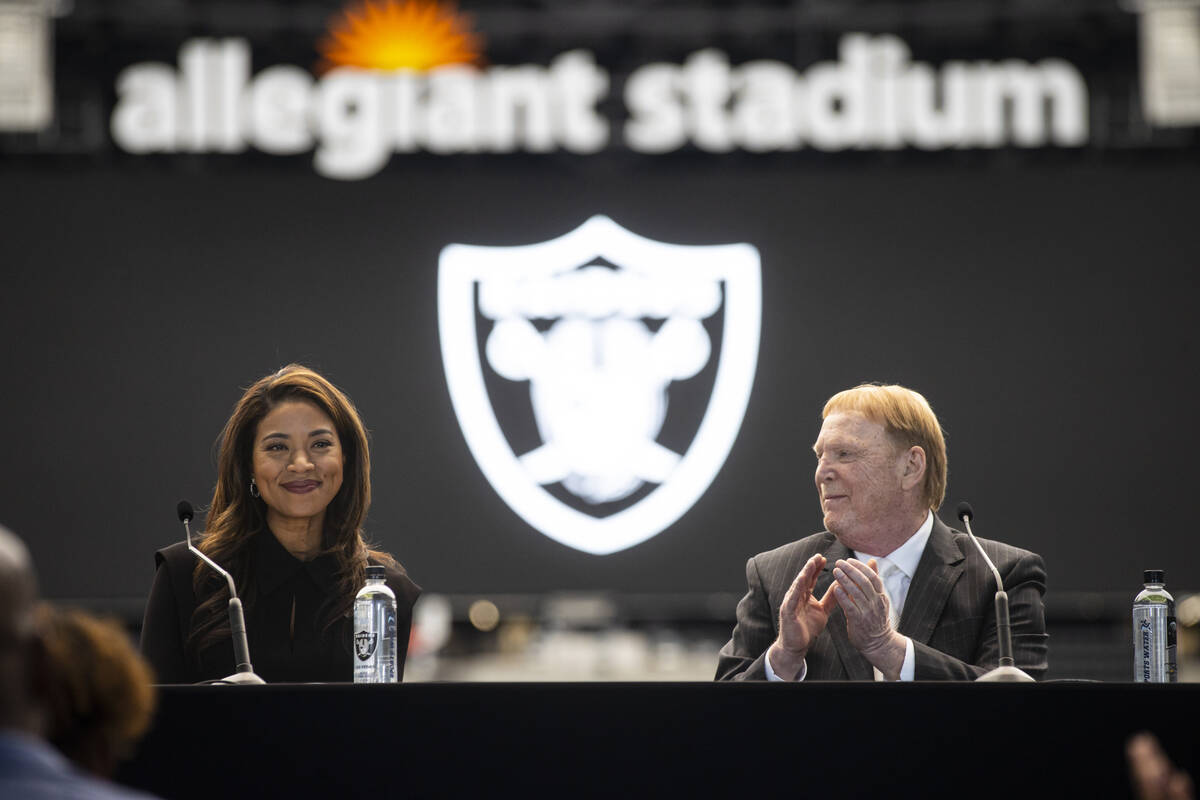 Sandra Douglass Morgan, the new president of the Raiders, speaks as team owner Mark Davis looks ...