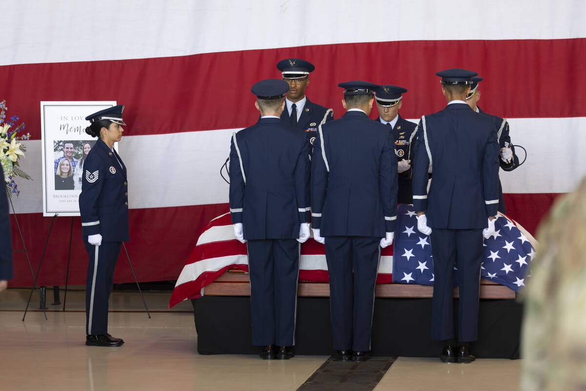 Members of the Nellis Air Force Base honor guard lay down the casket of Brooklynn Fellure, a ve ...
