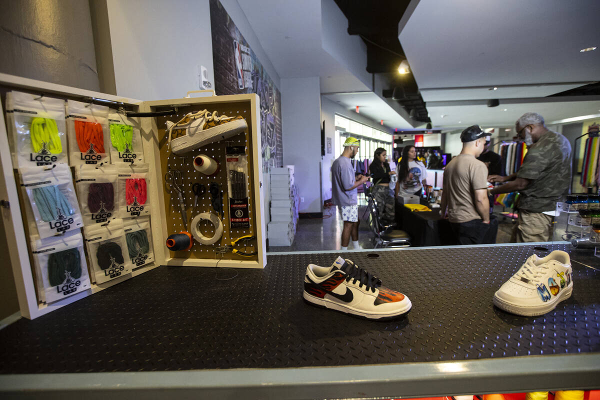 Customized sneakers at a booth by Majorwavez lab are seen at the NBA Summer League on Thursday, ...