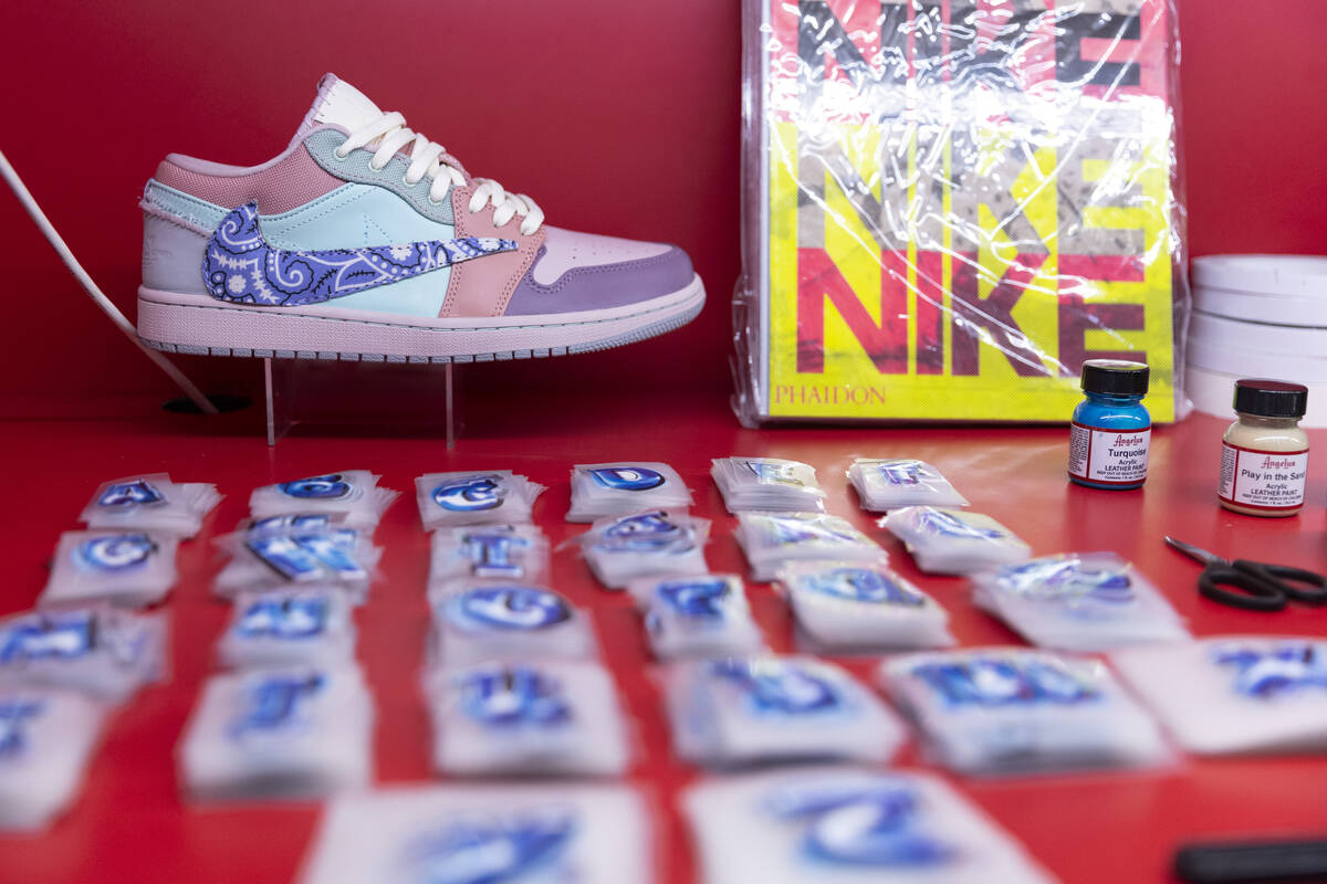 Custom sneakers are displayed at the Majorwavez lab booth during the NBA Summer League event at ...