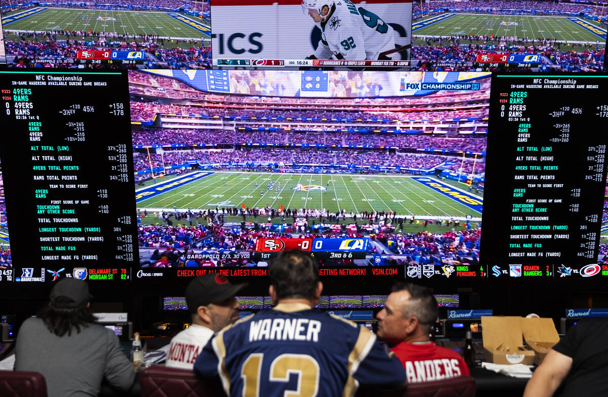 Los Angeles Rams and San Francisco 49ers fans watch the NFC Championship at Circa Sportsbook on ...