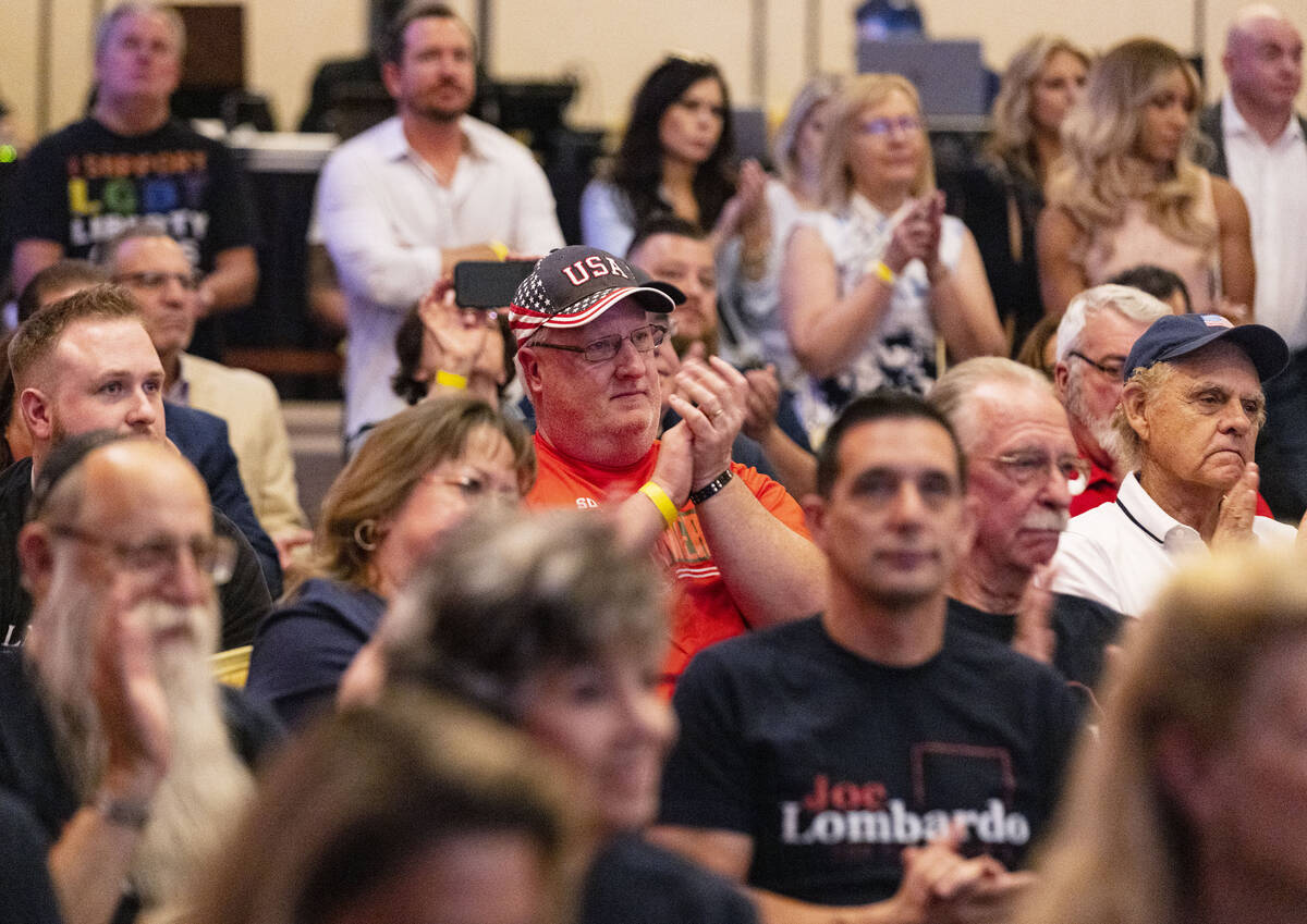 People attend the Republican Party campaign event at Treasure Island hotel-casino on Friday, Ju ...