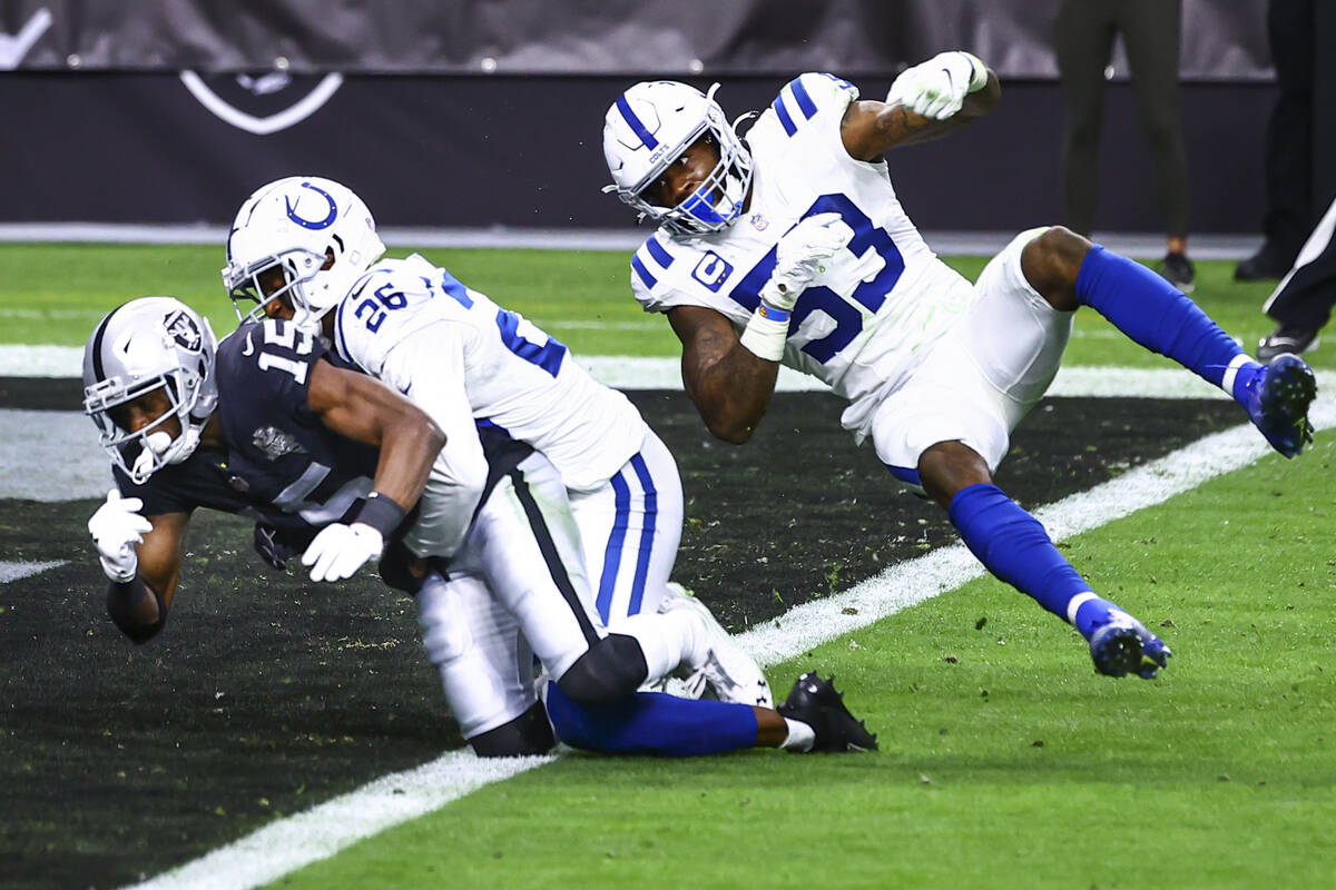 Indianapolis Colts cornerback Rock Ya-Sin (26) breaks up a pass intended for Raiders wide recei ...