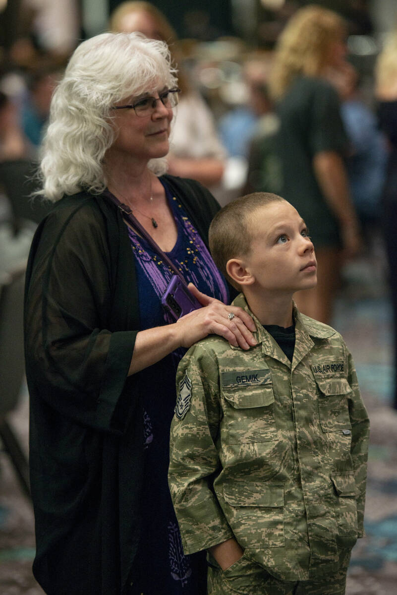 Deborah Smith wait with her grandson Zackary Gemik, 11, to meet chef and TV personality Guy Fie ...