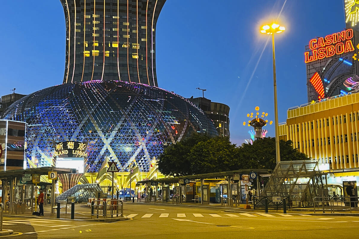 Grand Lisboa, center, is closed in Macao, Monday, July 11, 2022. Streets in the gambling center ...