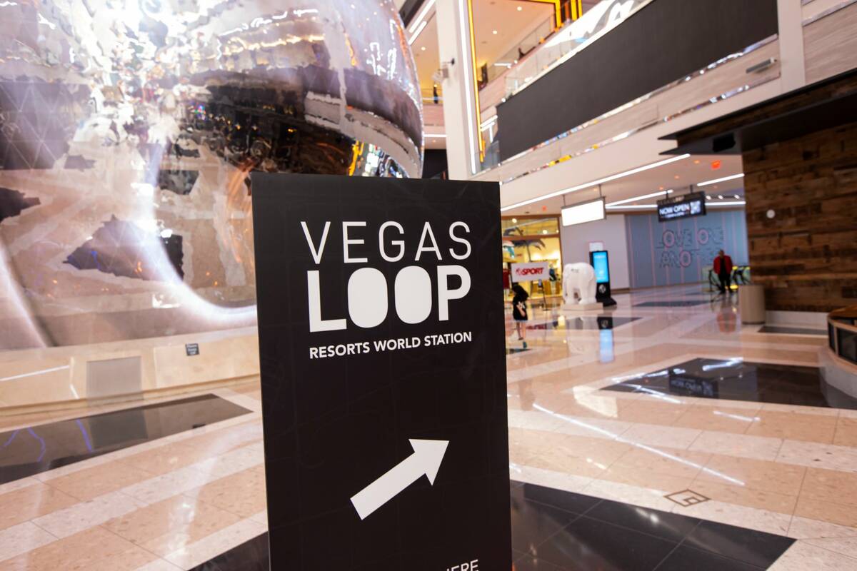 Signage for the Vegas Loop leading to the Boring tunnel passenger station at Resorts World Las ...