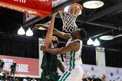 Milwaukee Bucks Sandro Mamukelashvili (54) dunks over Boston Celtics Mfiondu Kabengele (28) dur ...