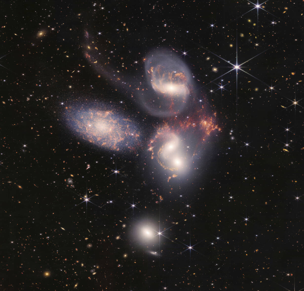 This image provided by NASA on Tuesday, July 12, 2022, shows Stephan's Quintet, a visual groupi ...
