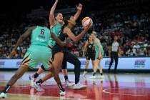 Las Vegas Aces forward A'ja Wilson (22) goes up for a shot against the New York Liberty at Mich ...