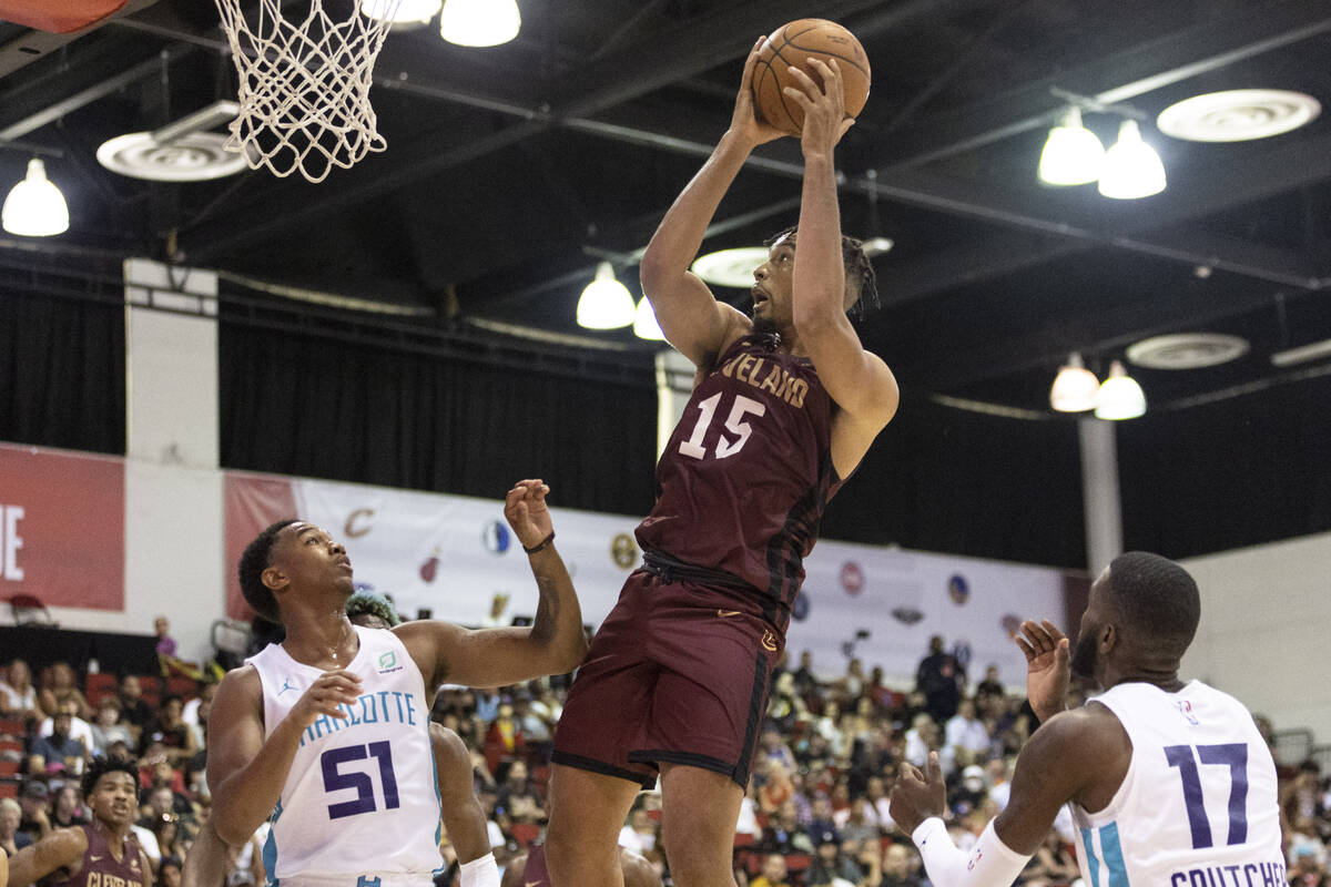 Cleveland Cavaliers Isaiah Mobley (15) takes a shot as Charlotte Hornets Ty-Shon Alexander (51) ...