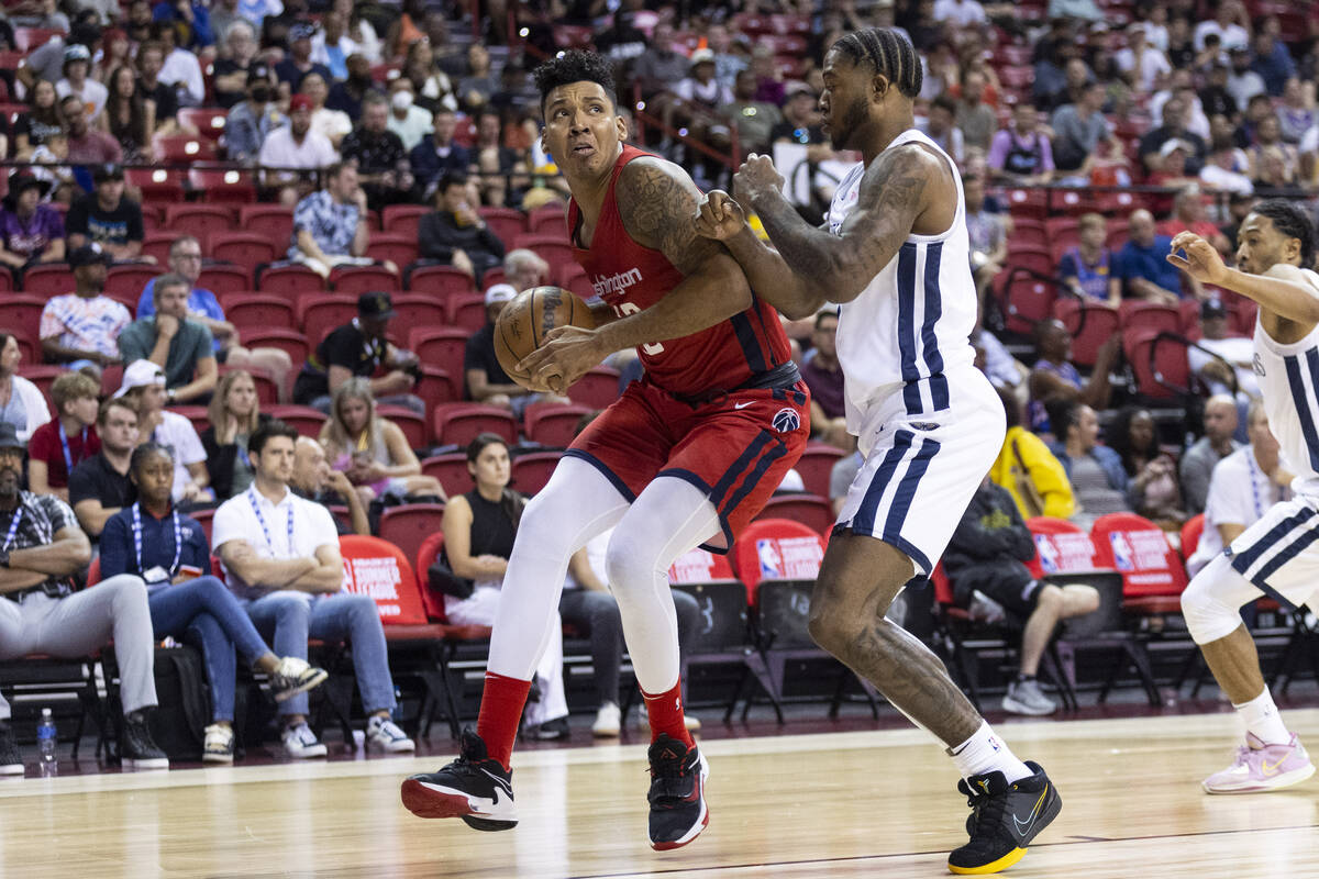 Washington Wizards' Jaime Echenique (12) looks for an open shot under pressure from New Orleans ...