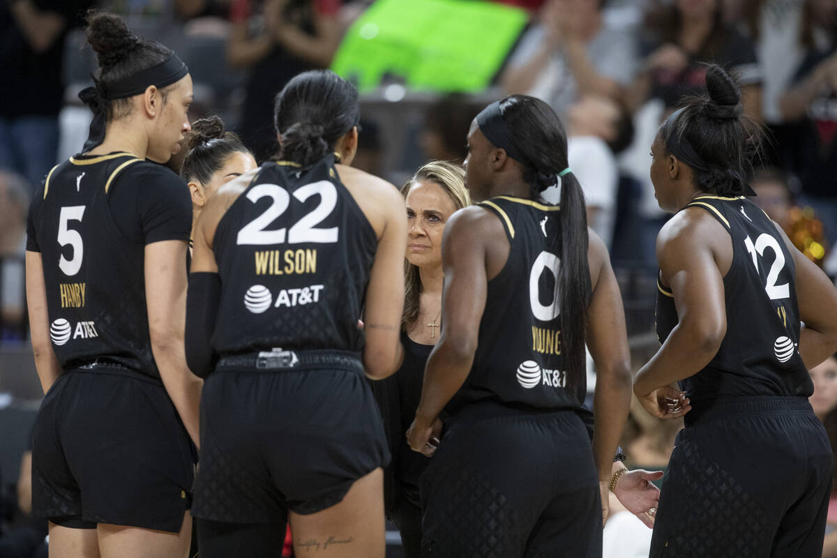 The Las Vegas Aces coach Becky Hammon talks to the team during the game the New York Liberty at ...