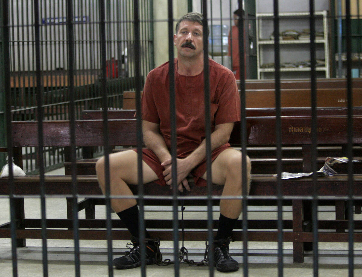 FILE - Viktor Bout sits while waiting for his verdict at the detention room at a criminal court ...