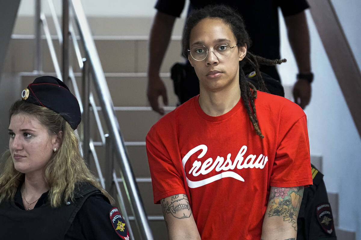 FILE - WNBA star and two-time Olympic gold medalist Brittney Griner is escorted to a courtroom ...