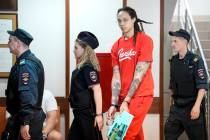 WNBA star and two-time Olympic gold medalist Brittney Griner is escorted to a courtroom for a h ...