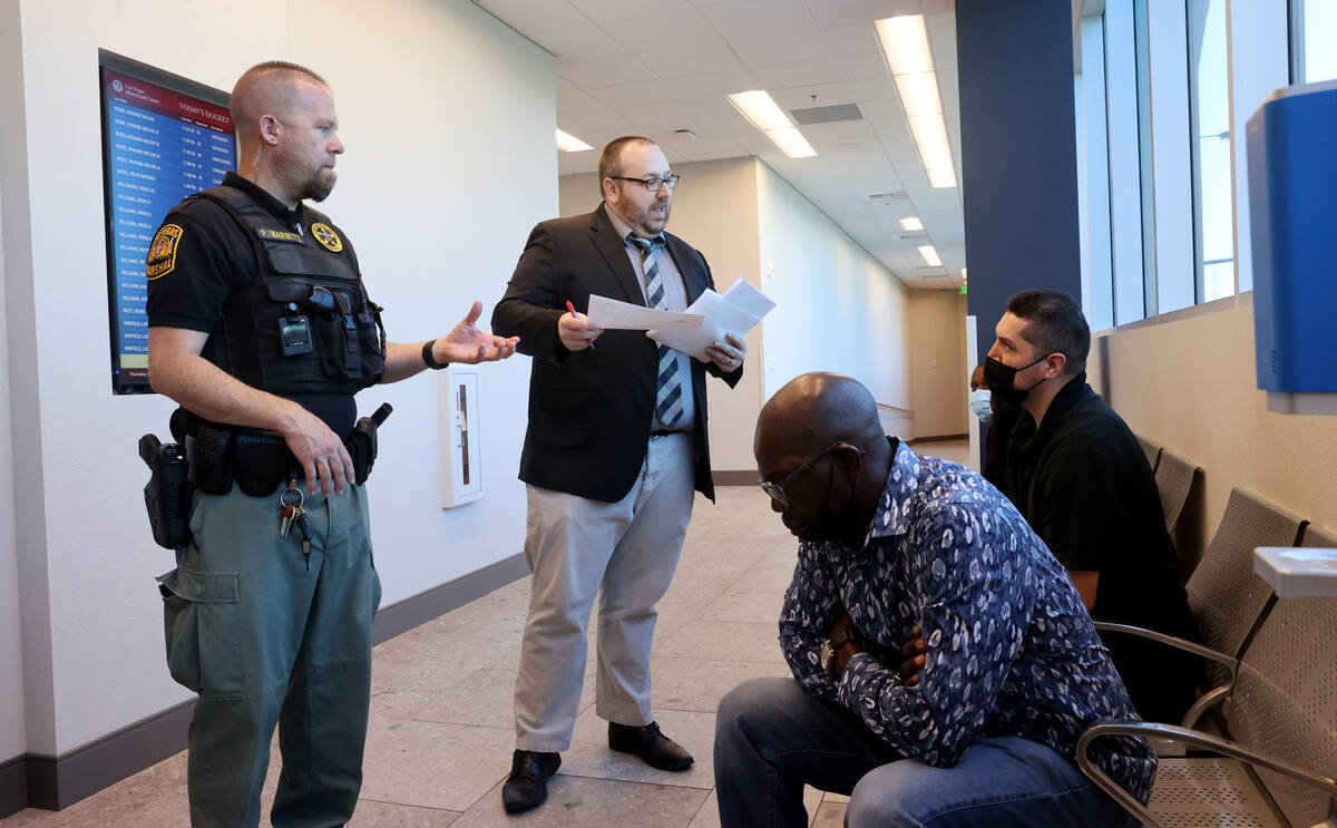 Las Vegas Deputy City Attorney Bobby Anderlik talks to people before they appear on traffic tic ...