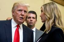 FILE - Donald Trump, left, his son Donald Trump Jr., center, and his daughter Ivanka Trump spea ...