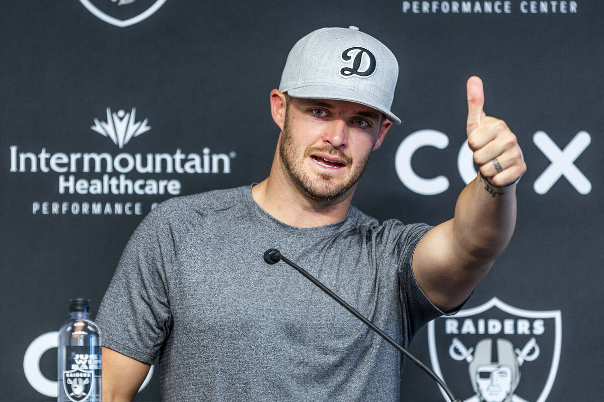 Raiders quarterback Derek Carr talks during minicamp practice at the Raiders headquarters withi ...