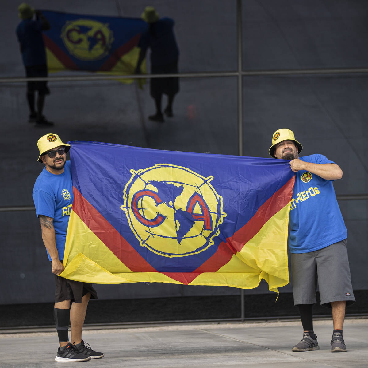 Club América fans outside Allegiant Stadium before the start of a soccer game against Chel ...