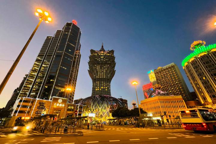 Grand Lisboa, center, is closed in Macao, Monday, July 11, 2022. Streets in the gambling center ...