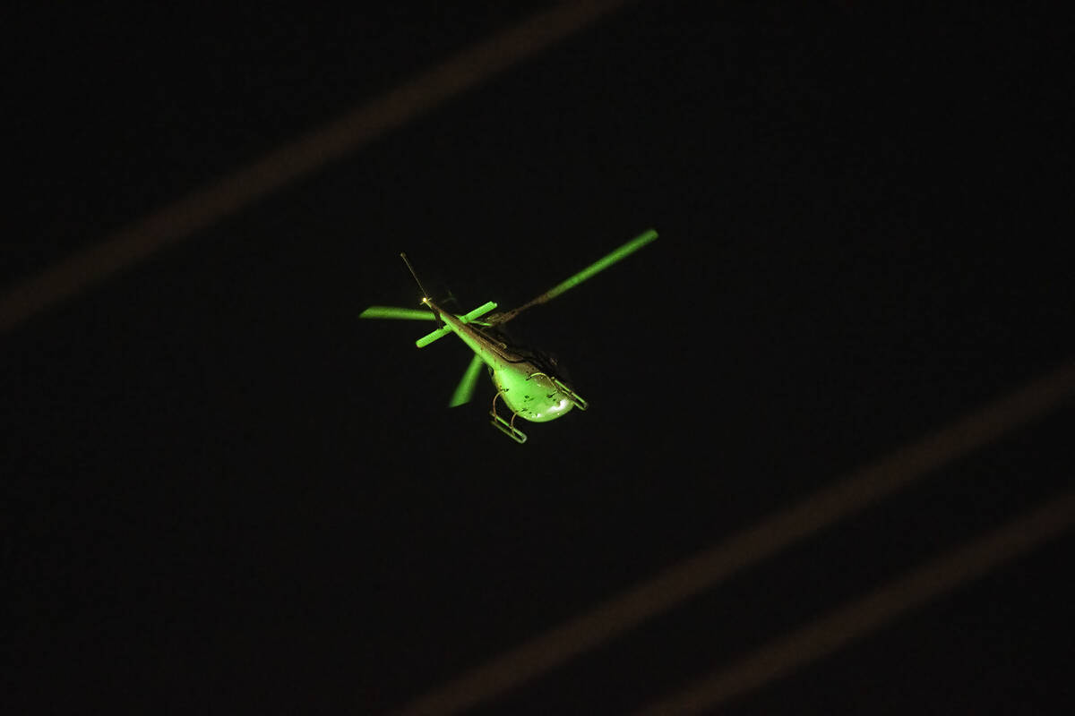 Helicopters patrol the Strip on Saturday, July 16, 2022, Las Vegas. (Benjamin Hager/Las Vegas R ...