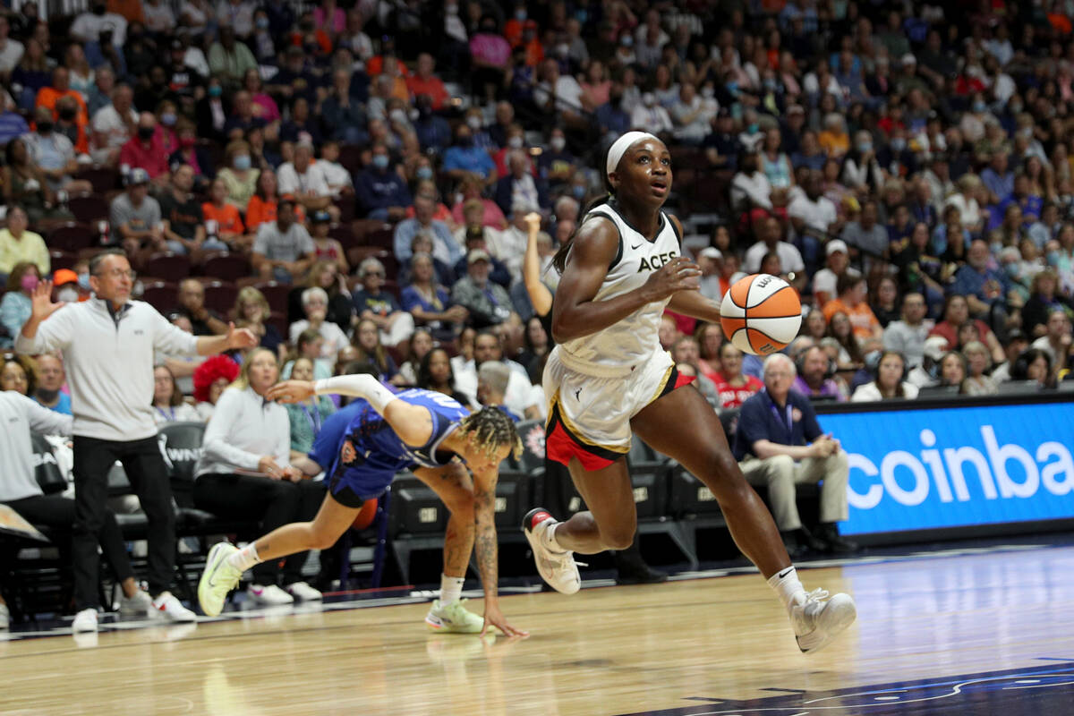 Jackie Young #0 of the Las Vegas Aces dribbles the ball during the game against the Connecticut ...