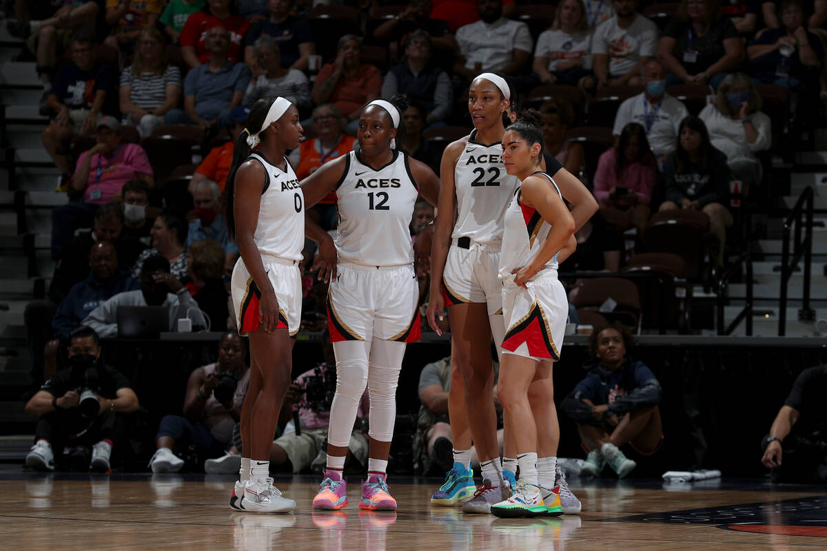 The Las Vegas Aces huddle during the game against the Connecticut Sun on July 17, 2022 at Moheg ...