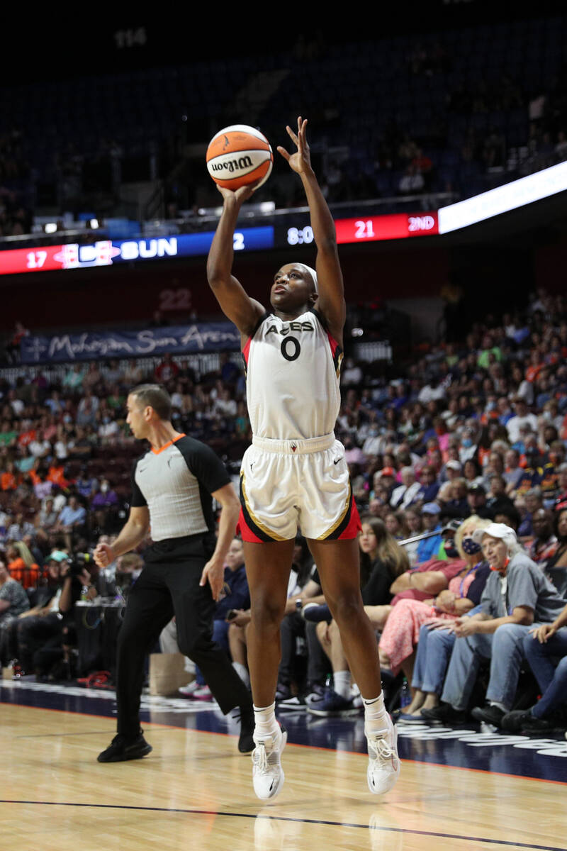 Jackie Young #0 of the Las Vegas Aces shoots a three point basket during the game against the C ...