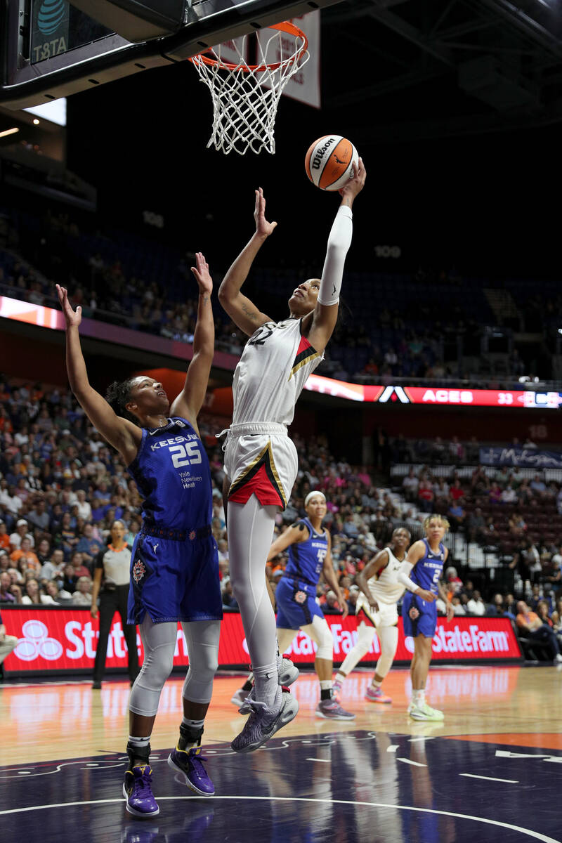 A'ja Wilson #22 of the Las Vegas Aces shoots the ball during the game against the Connecticut S ...