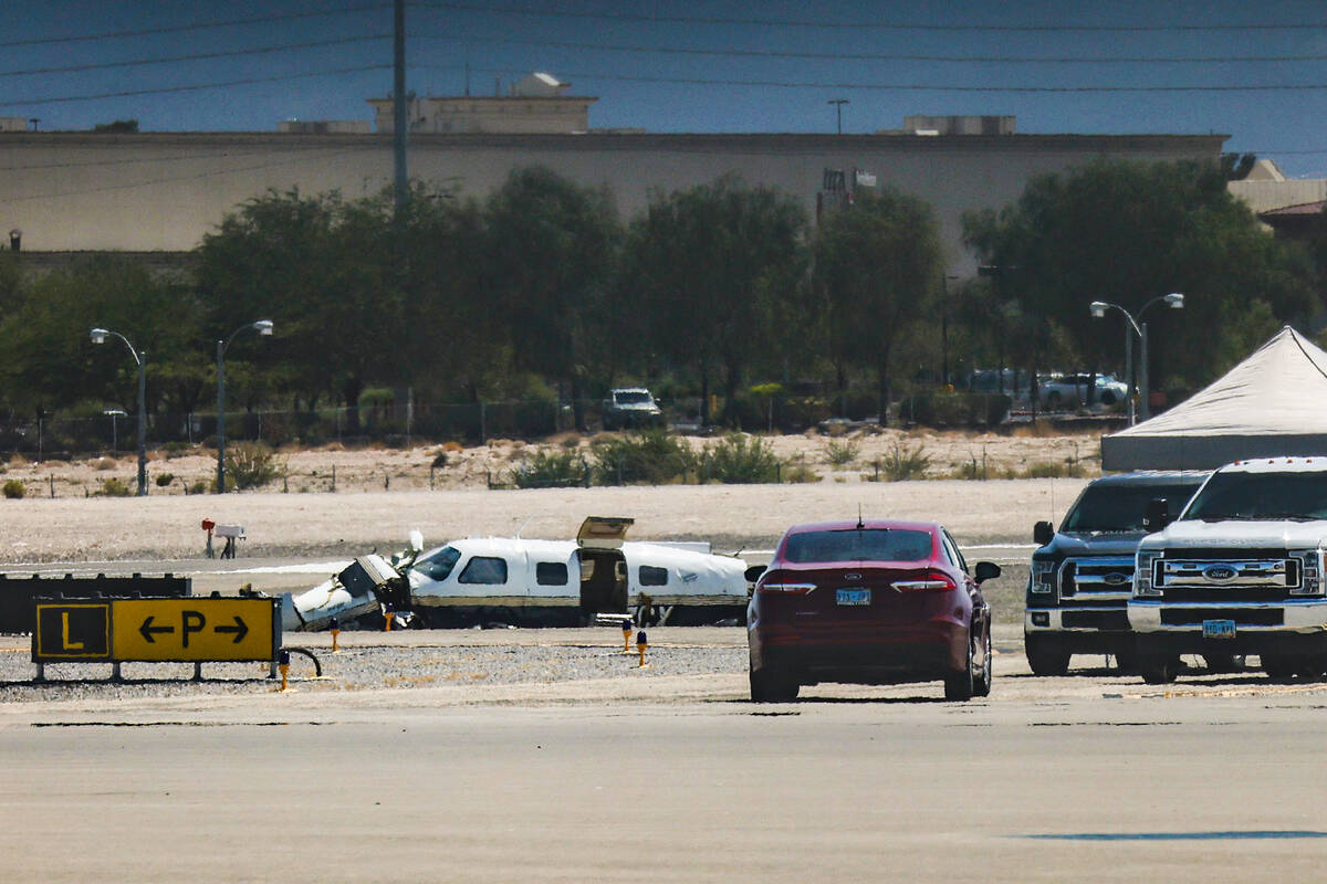 The scene of a plane crash at North Las Vegas Airport in North Las Vegas, Sunday, July 17, 2022 ...