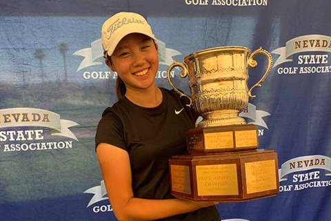 Eunice Han holds the winner's trophy after capturing the Nevada Women's State Amateur at Boulde ...