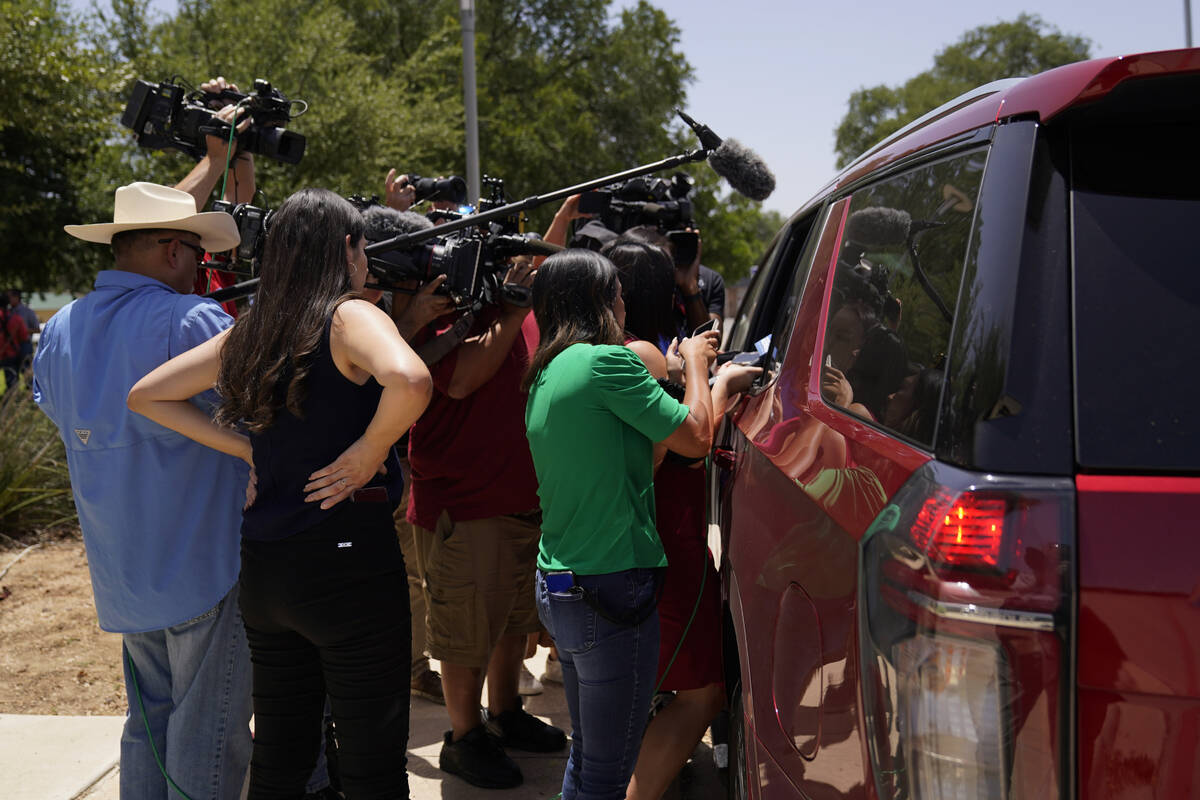 Media talks to the parents and other family members of shooting victim Uziyah Garcia after they ...