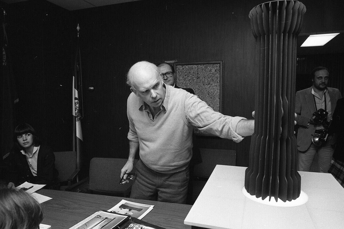 Internationally renowned sculptor Claes Oldenburg unveils his design for a 35ft black steel fla ...