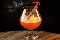 A Fire Squad cocktail from the new #IYKYK tableside mixology menu at Clique Bar & Lounge in The ...